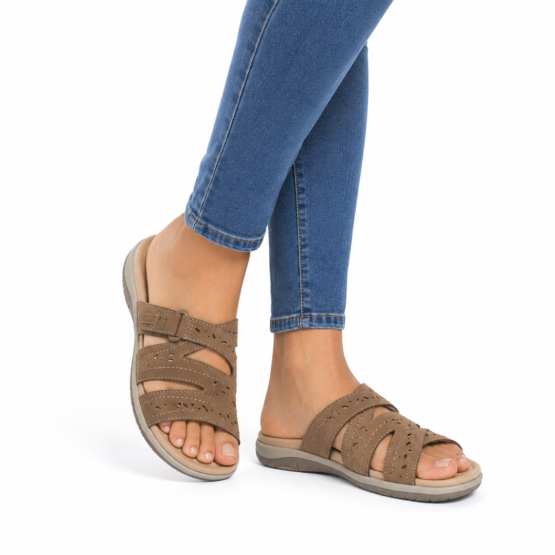 Orthopedic women's sandals designed for foot health, featuring adjustable straps & cushioned comfort.