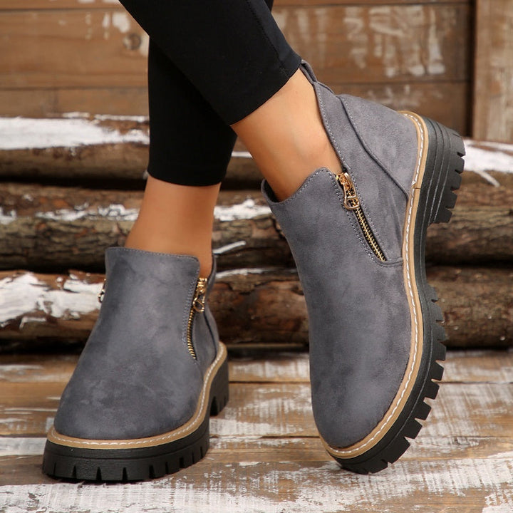 Stylish women's ankle boots with orthopedic arch support & slip-resistant sole for fall fashion.
