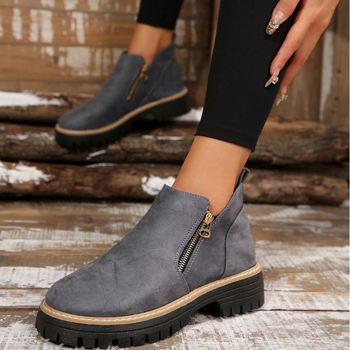 Comfortable women's orthopedic ankle boots with arch support, slip & water-resistant for winter.