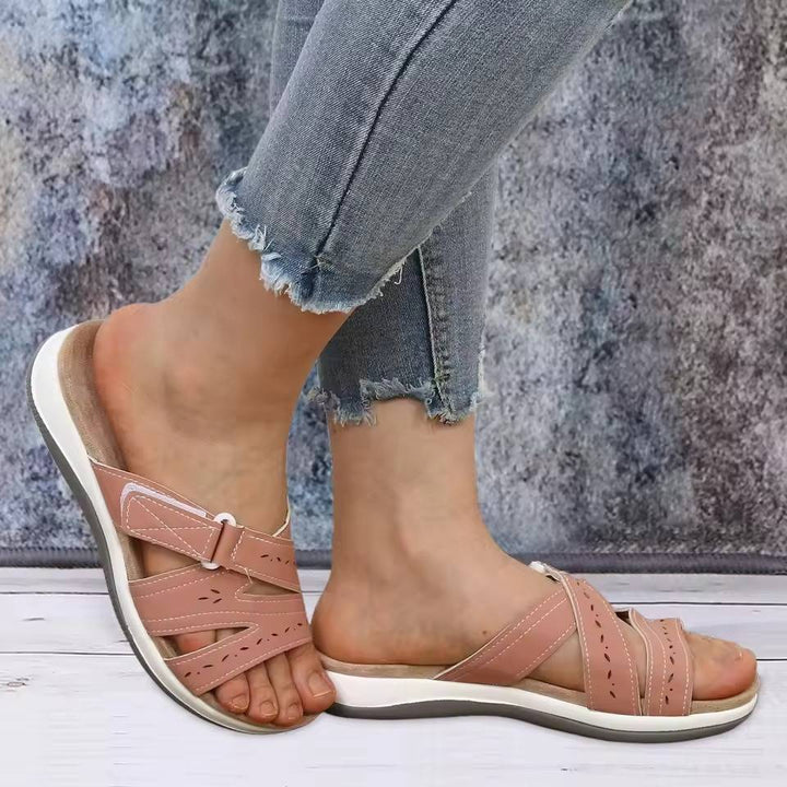 Top view of women's orthopedic toe sandals, highlighting adjustable straps & arch support for foot pain.