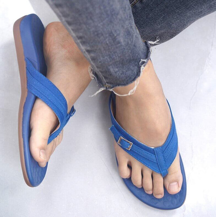 Women's toe sandals in various colors, showcasing orthopedic features and comfort.