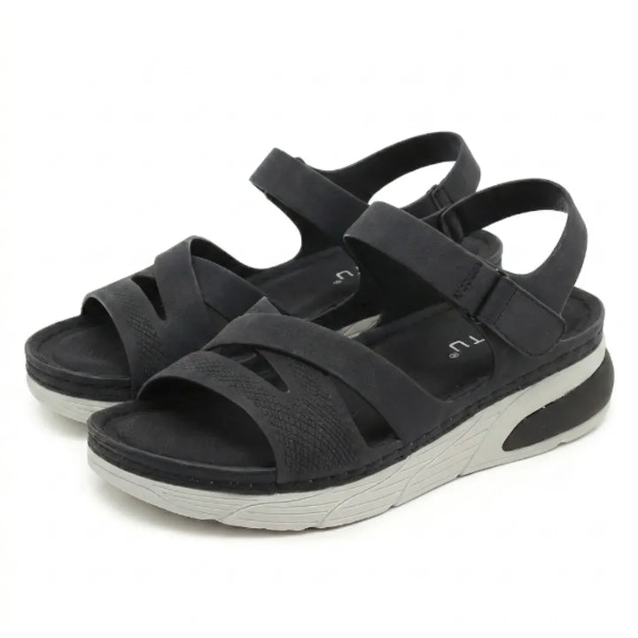 Supportive women's walking sandals, perfect for summer, featuring arch support & adjustable straps.
