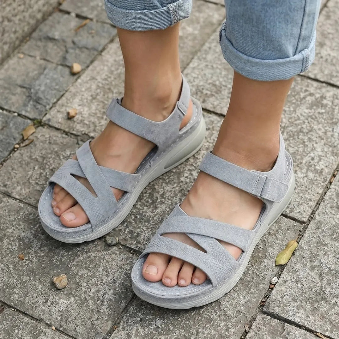 Women's summer footwear: adjustable strap sandals offering orthopedic arch support & comfort.