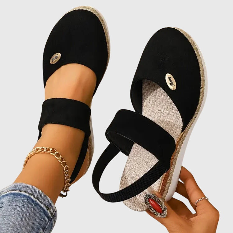 Durable non-slip sole of women's orthopedic walking sandals, with cushioned support for stability.