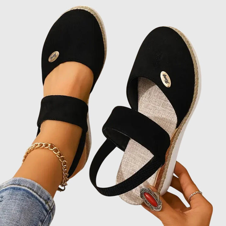 Durable non-slip sole of women's orthopedic walking sandals, with cushioned support for stability.