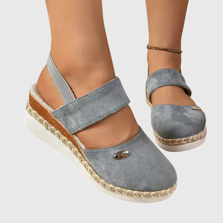 Slip-on women's breathable orthopedic walking sandals with cushioned support for all-day comfort.