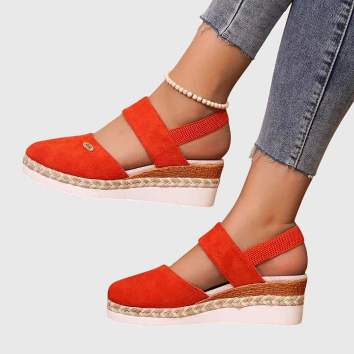 Top view of breathable slip-on women's orthopedic sandals for comfortable walking & arch support.