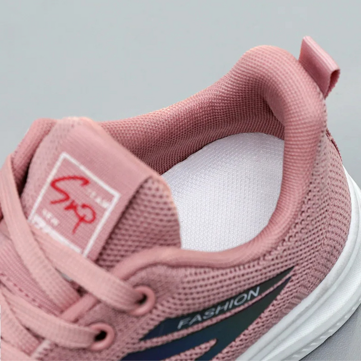 Sporty women's walking shoes with excellent orthopedic support for active lifestyles & foot health.