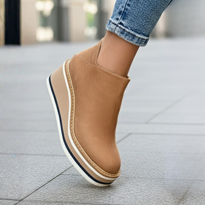 Stylish orthopedic wedge ankle boots for women. Supreme comfort in versatile colors like beige, black, or brown.