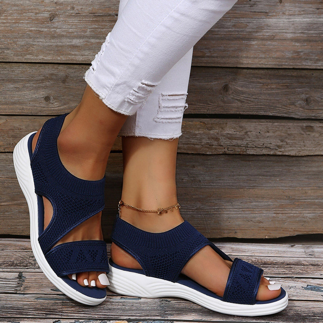 Stylish women's open-toe wedge sandals, offering orthopedic comfort and arch support for summer.