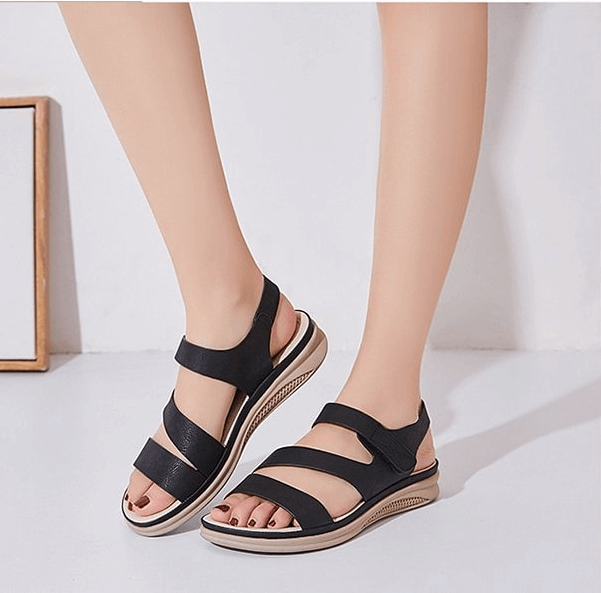 Stylish ladies' wedge sandals, supportive & comfortable for all-day wear.