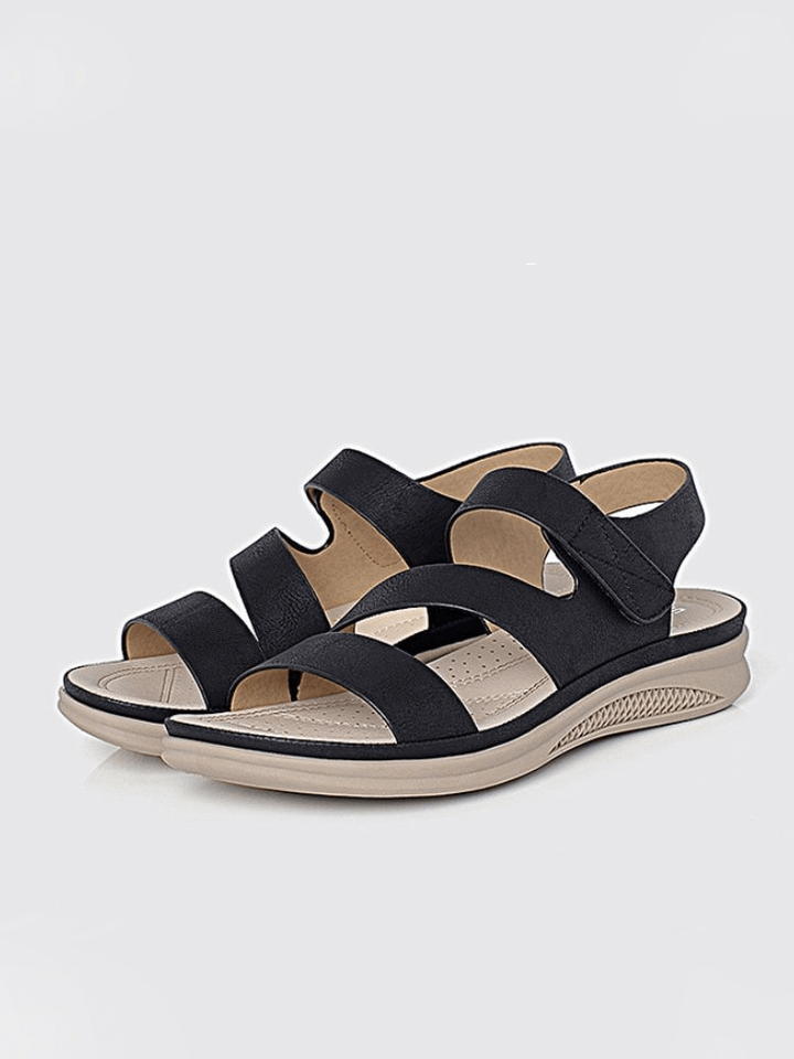 Supportive women's wedge sandals, designed for all-day comfort & style.