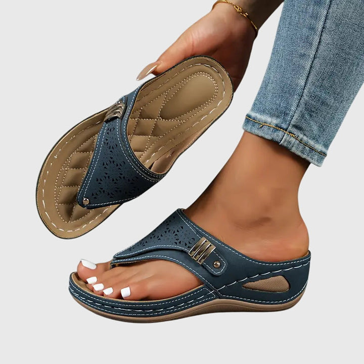 Slip-on comfort footwear: women's orthopedic sandals providing foot pain relief and arch support.