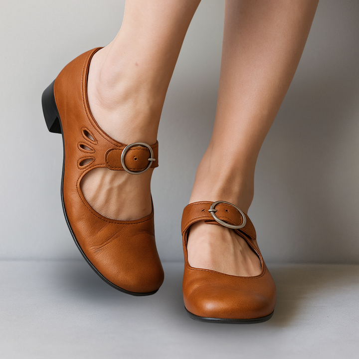 Comfortable women's orthopedic sandals with a supportive wedge sole, ideal for arch support & pain relief.