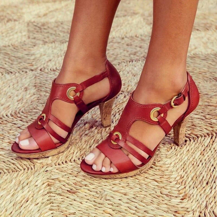 Woman wearing stylish orthopedic wedge sandals, perfect for summer & everyday comfort.