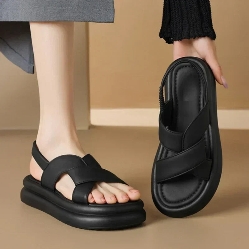 Fashionable women's sandals featuring orthopedic arch support and a comfortable wedge heel.