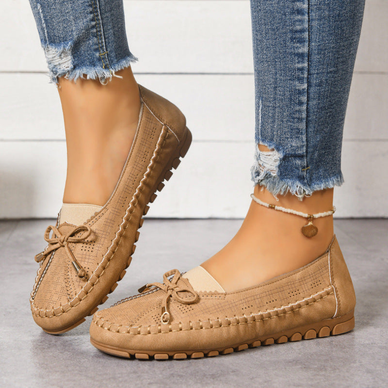 Women's orthopedic wide fit slip-on loafers, offering cushioned comfort & foot health support.