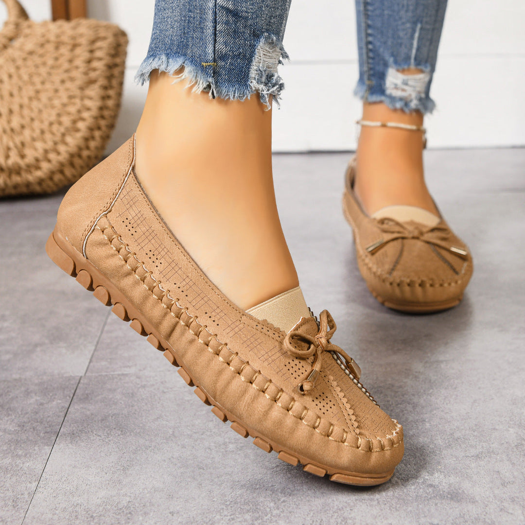Casual women's wide fit slip-on loafers with orthopedic support, perfect for everyday walking comfort.