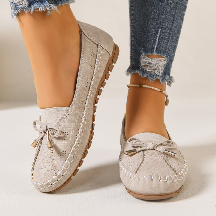 Women's wide fit orthopedic slip-on flats, designed for ultimate foot comfort & support.