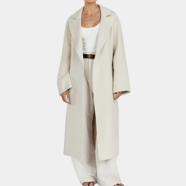 Women's oversized belted trench coat, long fit, elegant for versatile fall outerwear.