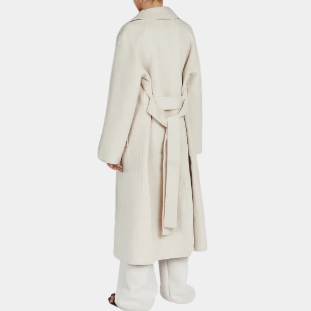 Chic women's long trench coat with belt, oversized style, perfect for sophisticated fall fashion.