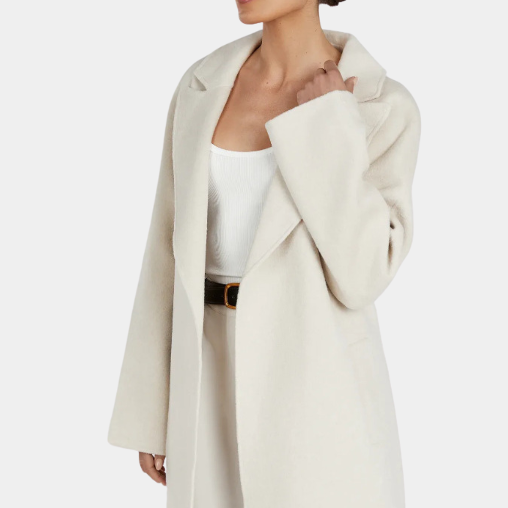 Elegant women's oversized belted trench coat, long fit, ideal for both formal and casual wear.