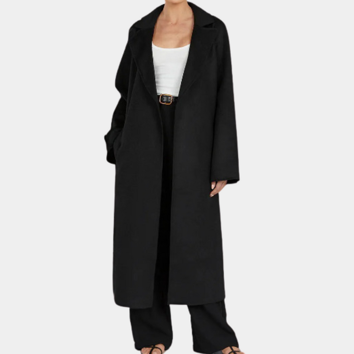 Fashionable women's oversized trench coat with a stylish belt, long and chic, essential fall outerwear.