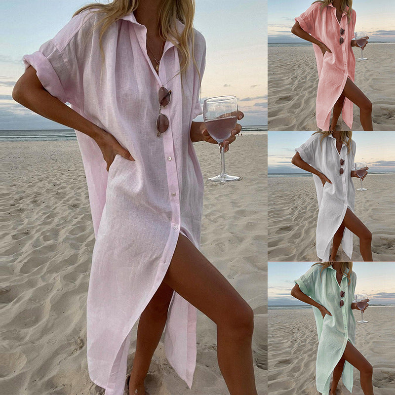 Women's oversized button-down roll sleeve beach shirt dress, perfect as a lightweight summer cover-up or resort wear.