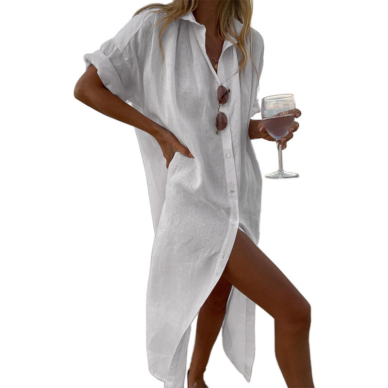 Women's button-down roll sleeve beach shirt dress, an oversized cover-up for summer fashion & resort wear.