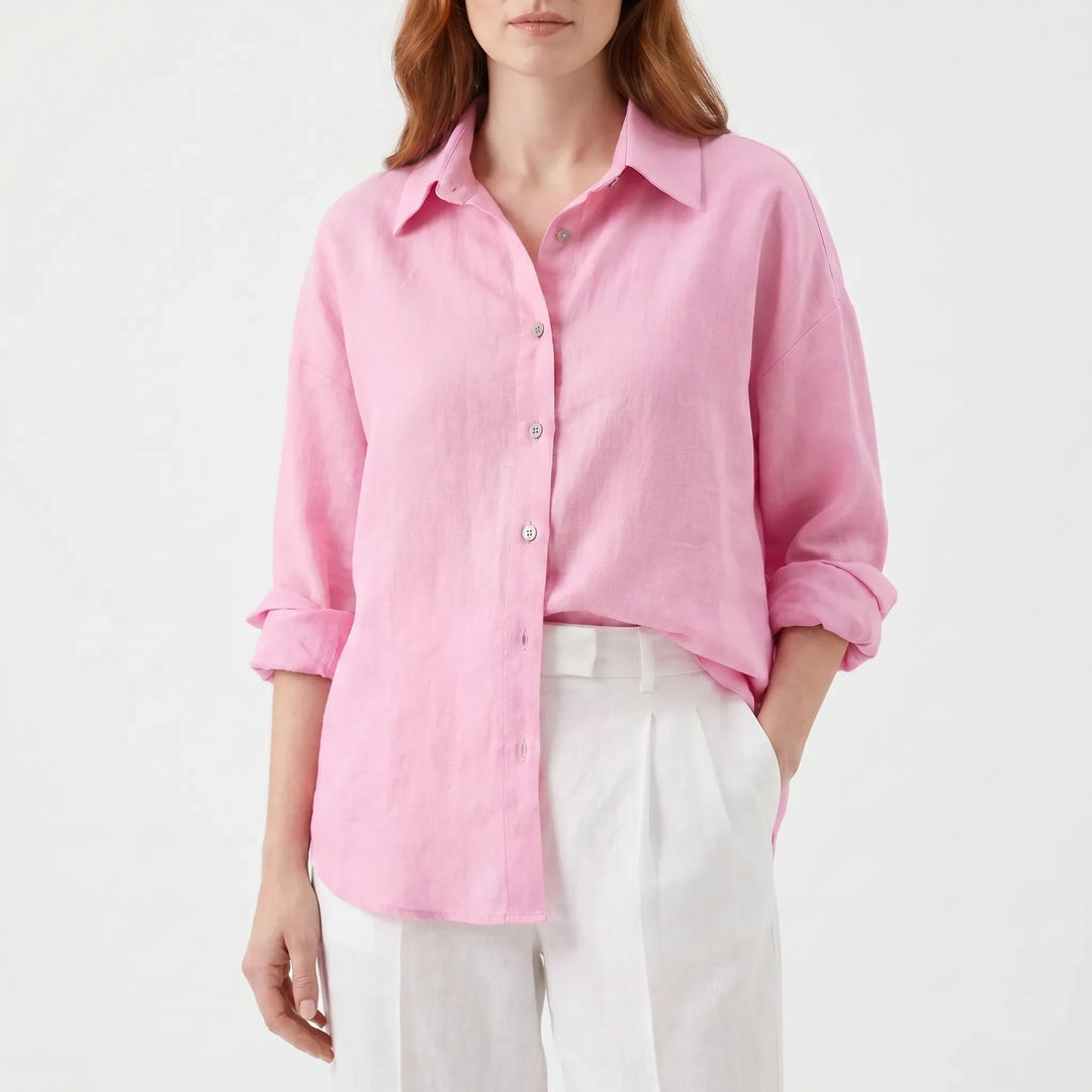 Breathable women's oversized shirt, a versatile button-down top. Perfect for layering or summer fashion.