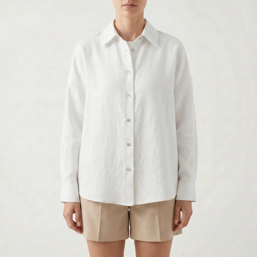 Oversized button-down shirt for women, offering a loose fit. A breathable long sleeve top for casual comfort.