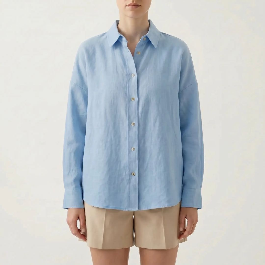 Women's fashion oversized button-down, perfect as a layering shirt. Chic, breathable, and relaxed fit top.