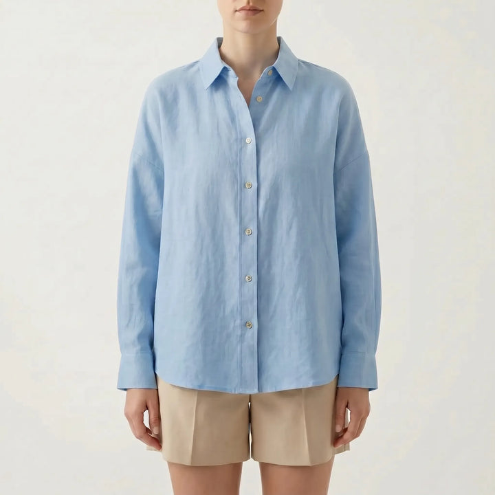 Women's fashion oversized button-down, perfect as a layering shirt. Chic, breathable, and relaxed fit top.