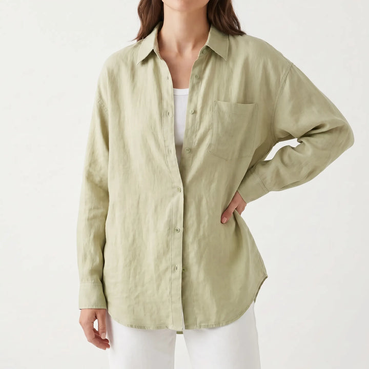 Stylish women's long sleeve button-down shirt, a versatile and comfortable oversized top for summer.