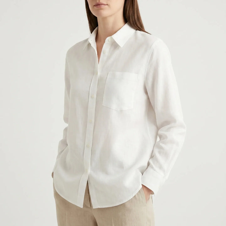 Elegant oversized women's shirt with a button-down front, perfect for a chic and comfortable look.