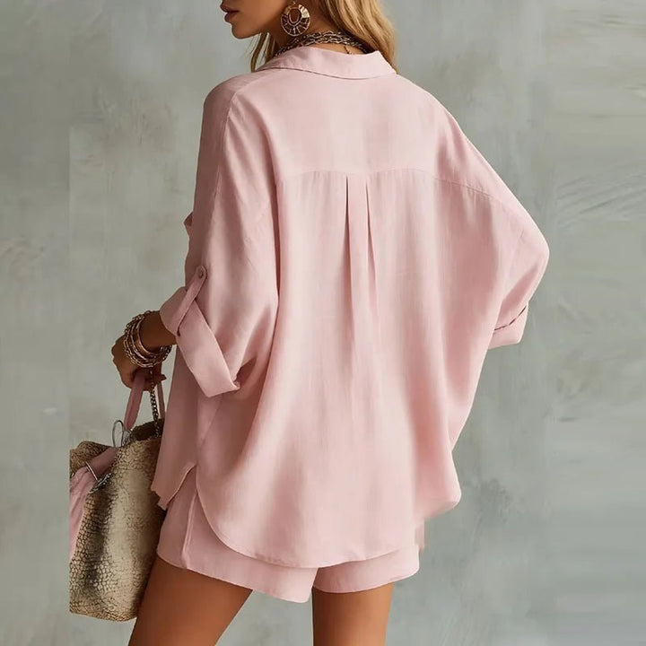 Relaxed fit women's oversized button-down shirt and shorts set, ideal for comfortable summer wear.