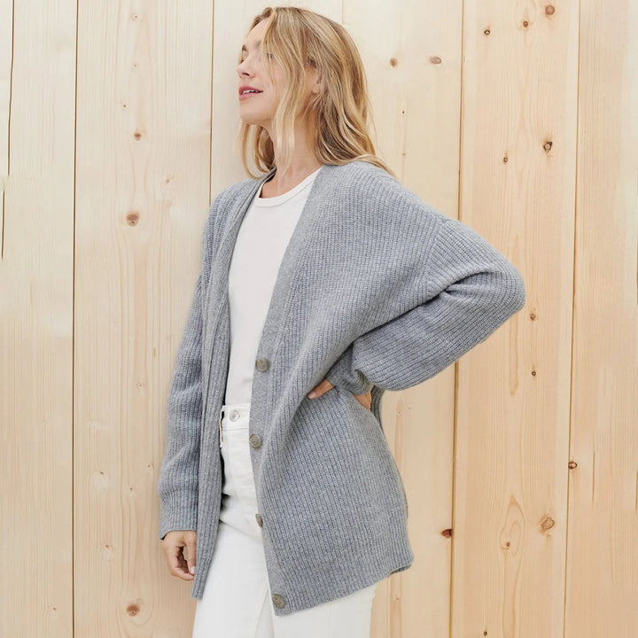 Women's button-up oversized v-neck cardigan, long sleeves for casual comfort & versatile style.