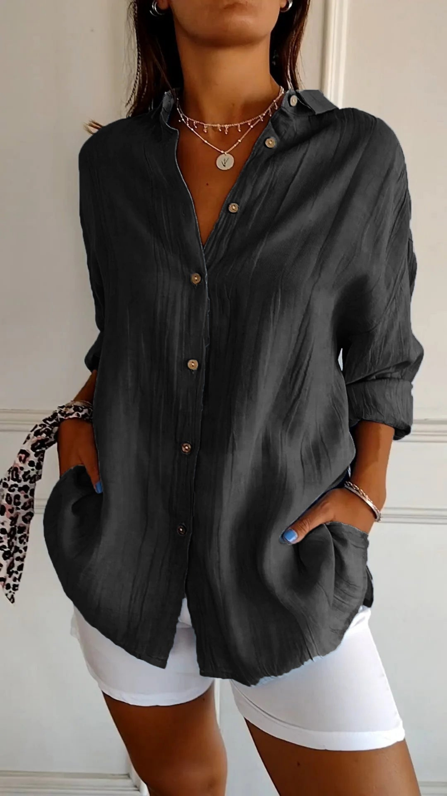 Breathable women's oversized long sleeve button-up shirt. Effortless style, relaxed fit, comfortable blouse.
