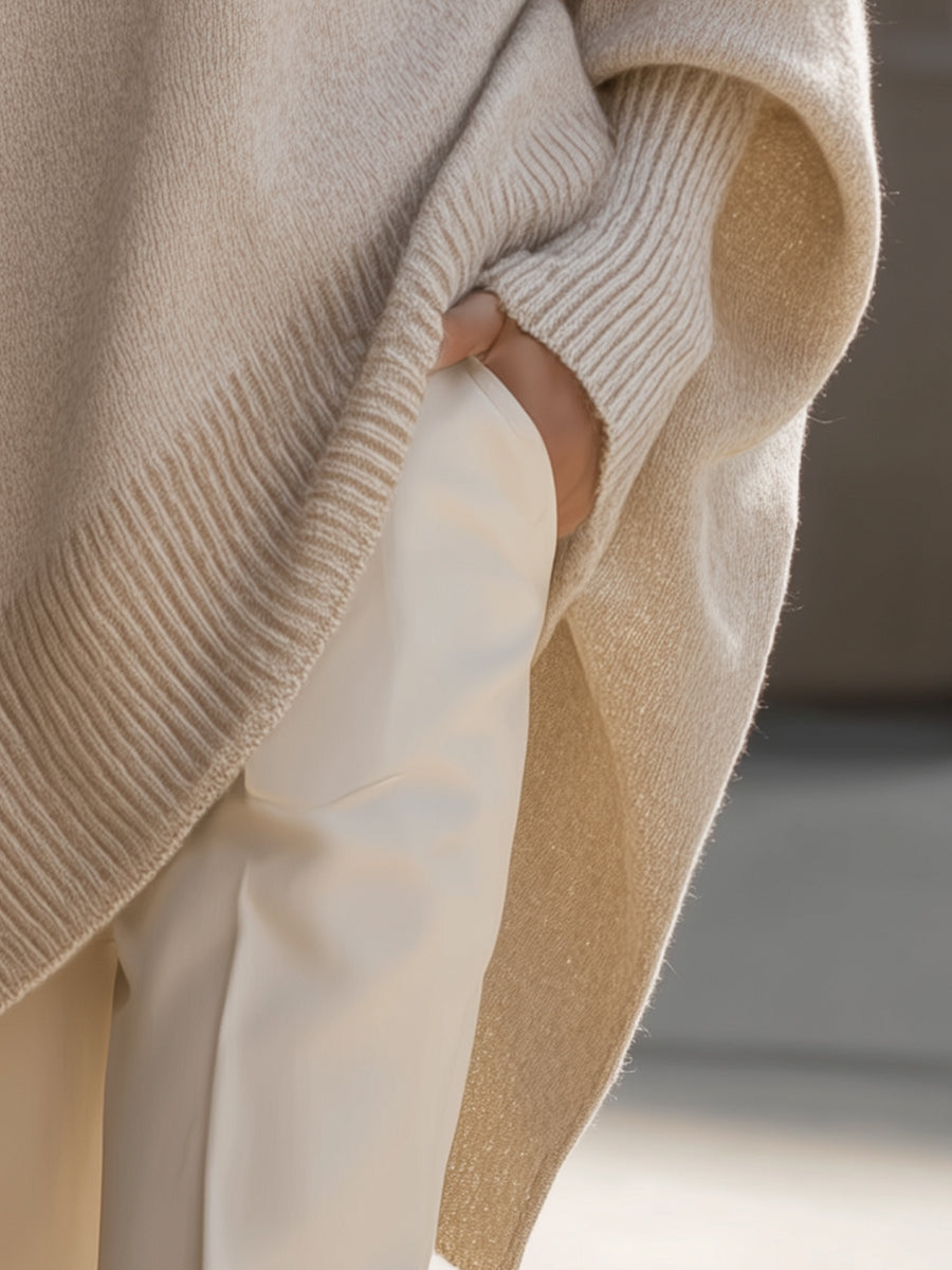 Women's batwing sleeve cape poncho, an oversized and comfortable layering top for autumn style.