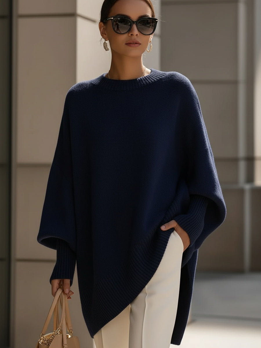 Women's elegant oversized cape poncho top, featuring batwing sleeves, perfect for versatile autumn layering.