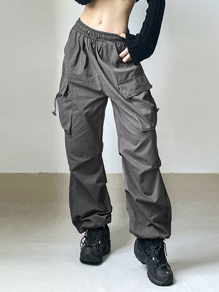 Women's comfortable oversized cargo pants featuring an adjustable waist for a relaxed, wide-leg fit.
