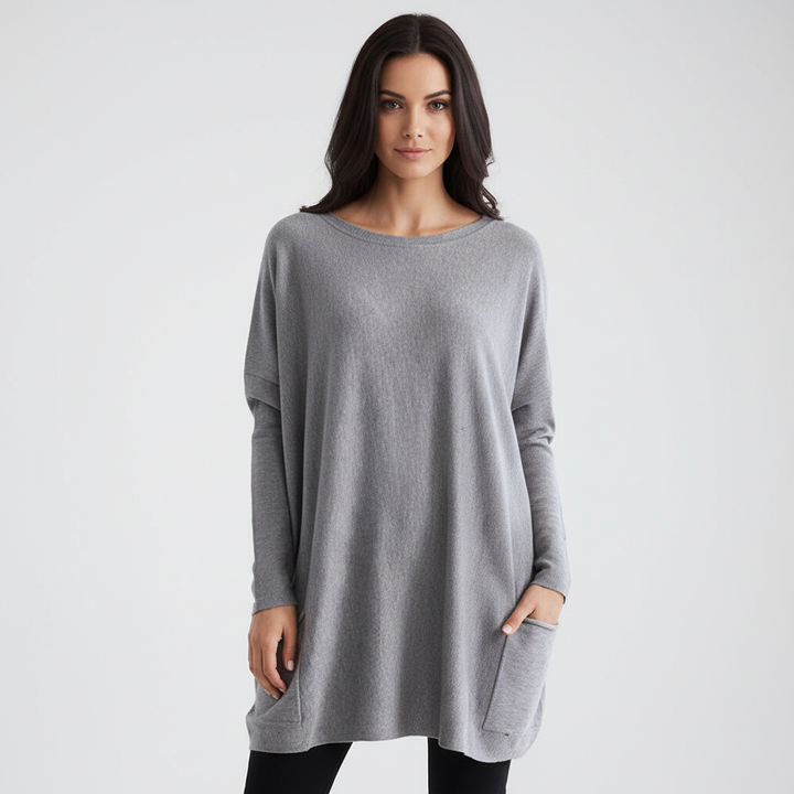 Detail shot of the cuff on an oversized long sleeve women's sweater, emphasizing quality and comfort.
