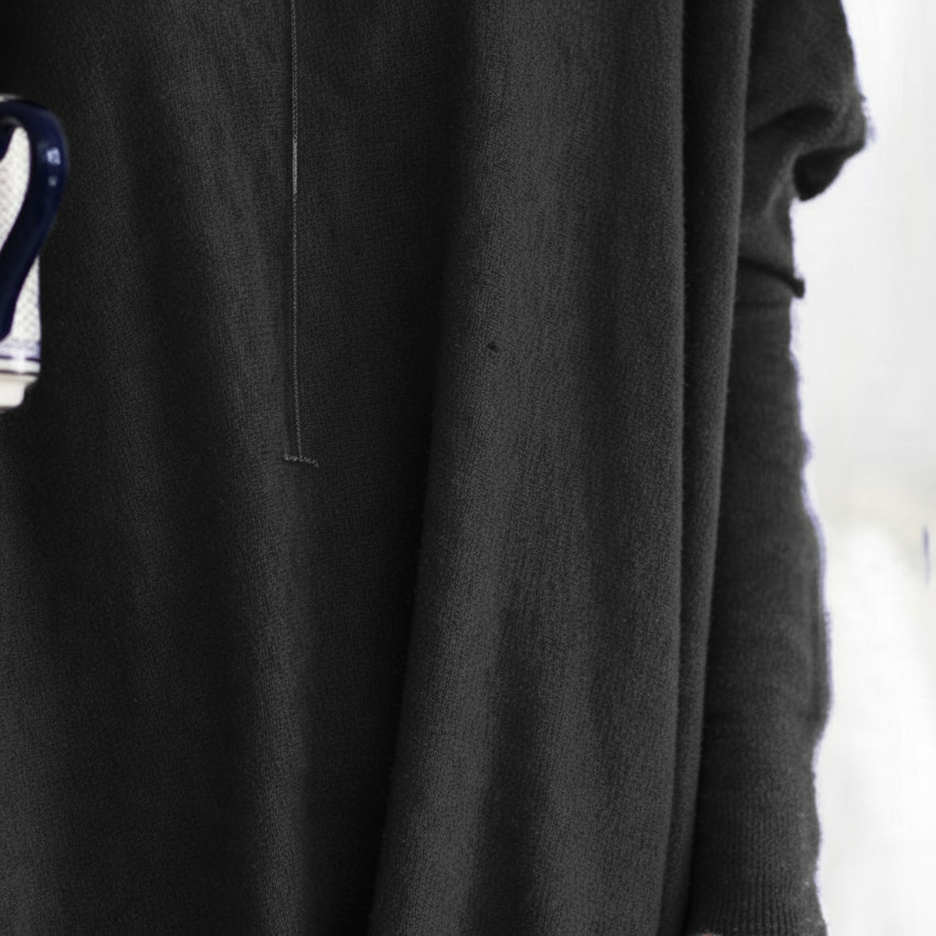 Cozy women's long sleeve oversized sweater, a comfortable and stylish addition to any loungewear collection.