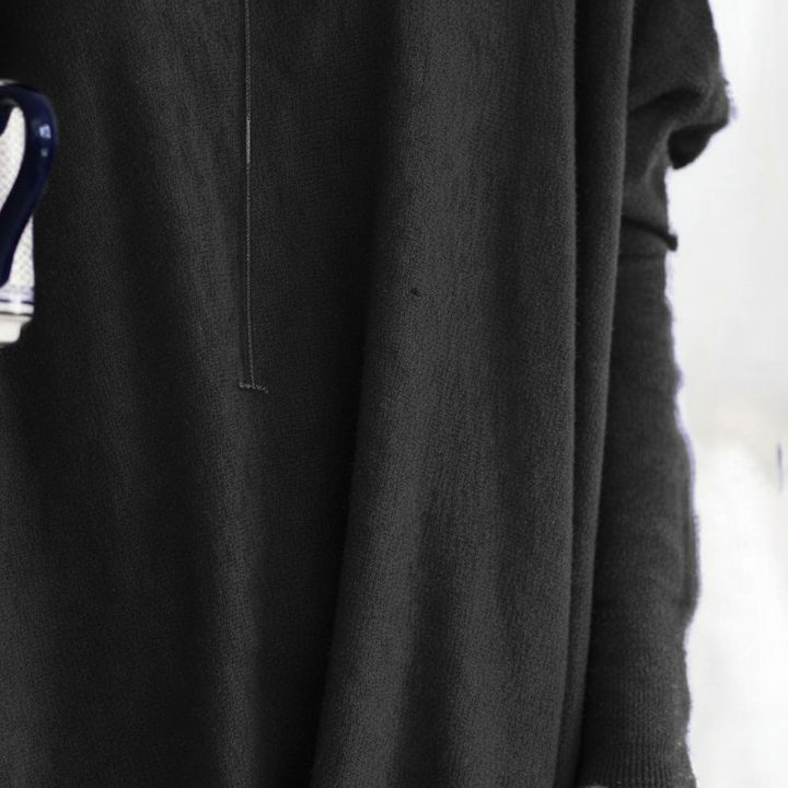 Cozy women's long sleeve oversized sweater, a comfortable and stylish addition to any loungewear collection.