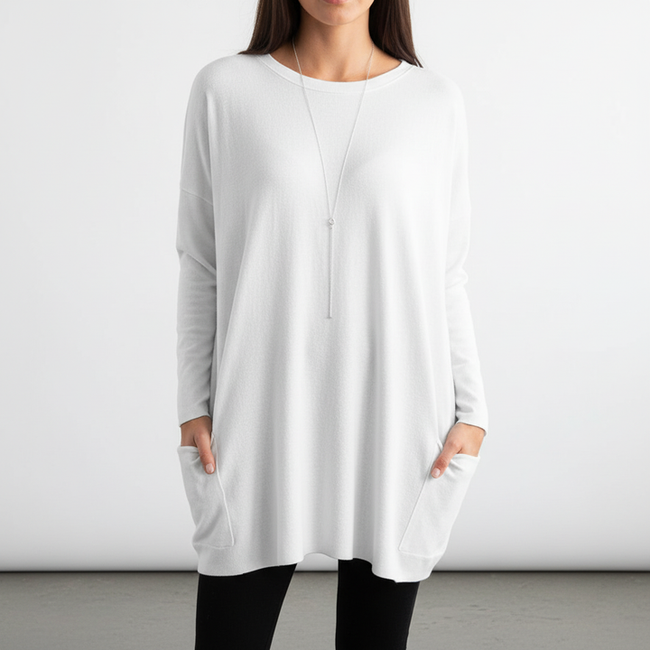 Back view of a comfortable oversized women's sweater, highlighting the roomy fit for loungewear.