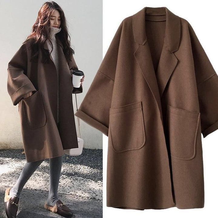 Women's oversized classic trench coat, a stylish and elegant double-breasted long coat for formal wear.