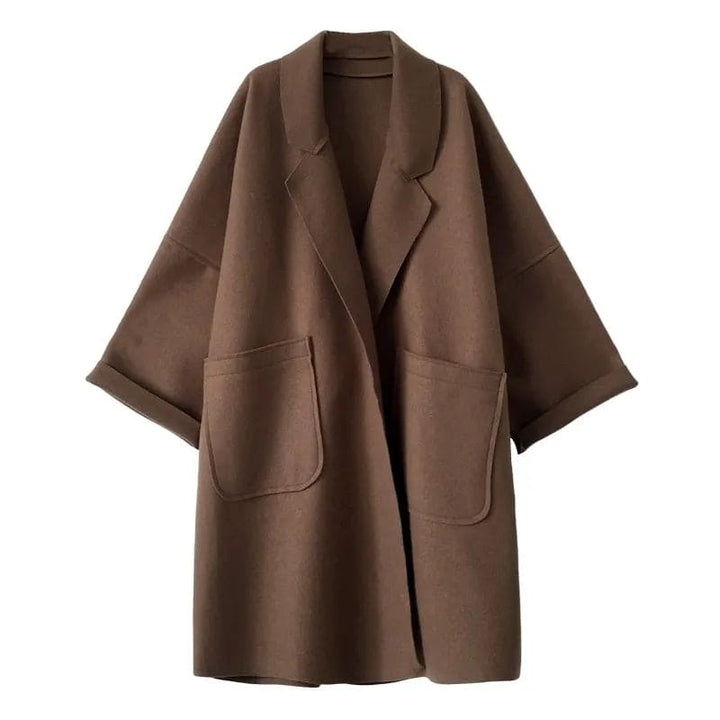 Formal women's oversized classic trench coat, a chic double-breasted long outerwear piece for sophisticated occasions.