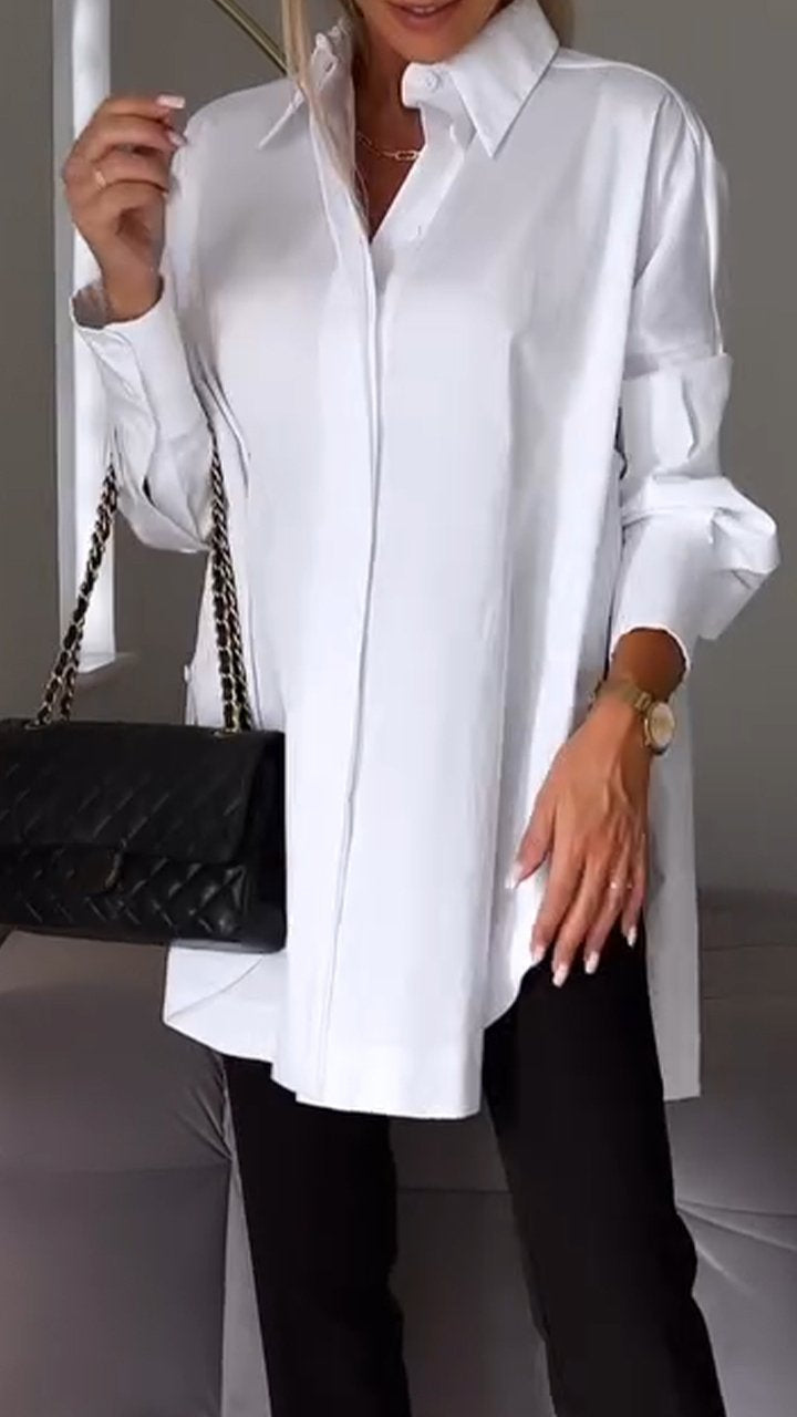 Stylish multi-color women's oversized blouse with a chic collar and long sleeves.