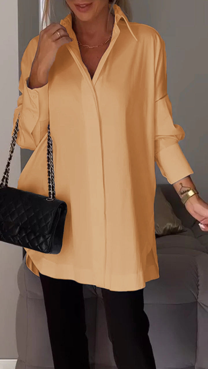 Effortless style with this women's oversized collar blouse; a comfortable, relaxed fit top.