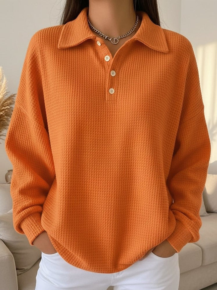 Women's oversized collared Henley pullover sweater, long sleeve for cozy autumn and fall fashion.